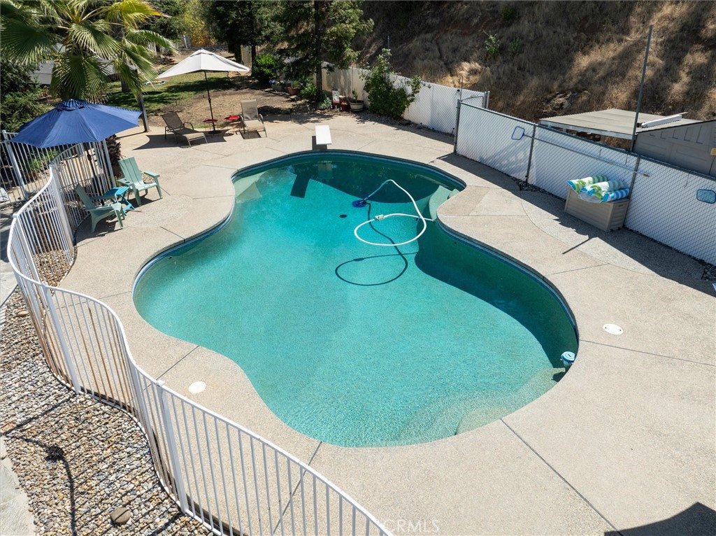46455 Konklin Road Coarsegold, CA 93614 - Photo 33 of 46 a view of a swimming pool with a patio