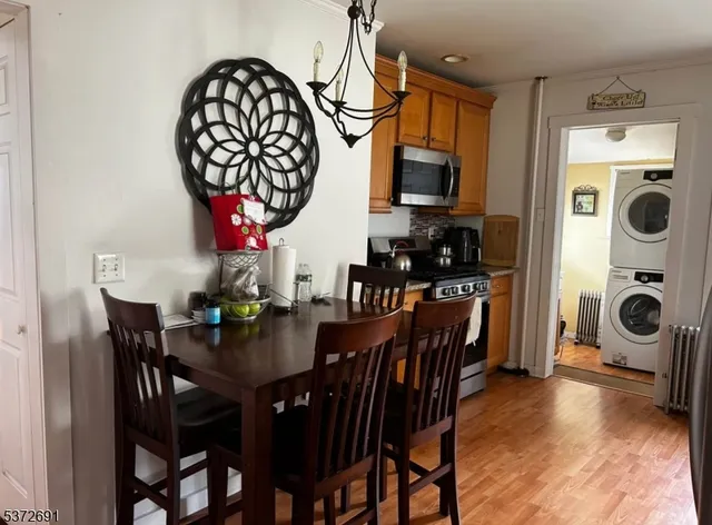 a view of a dining room and livingroom with furniture