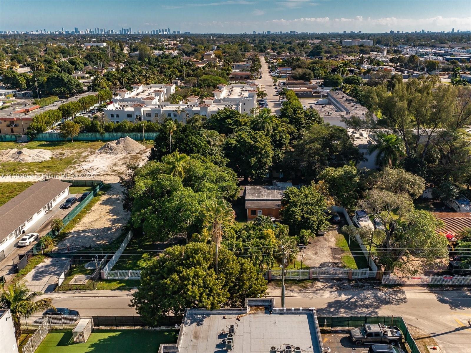 13265 Alexandria Drive Opa-Locka, FL 33054 - Photo 7 of 11 an aerial view of multiple house