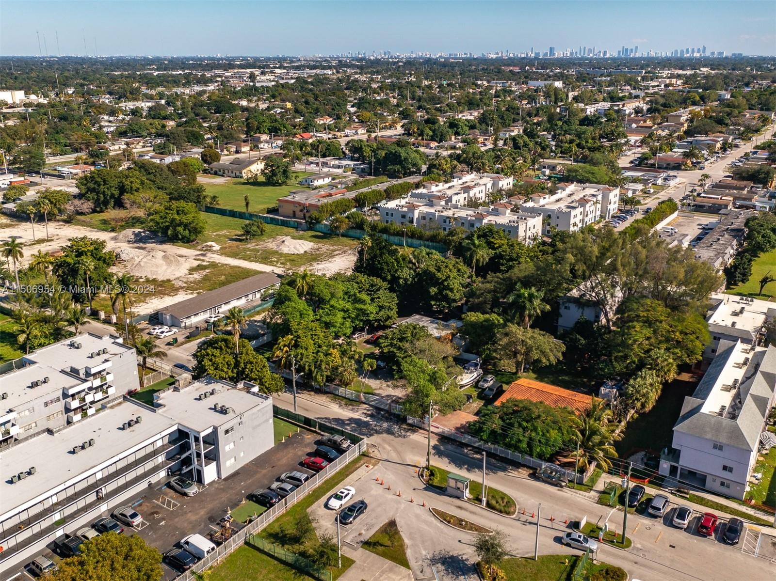 13265 Alexandria Drive Opa-Locka, FL 33054 - Photo 10 of 11 an aerial view of multiple house