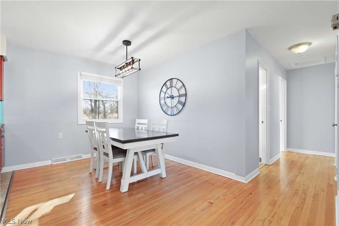 4003 Kenneth Road Stow, OH 44224 - Photo 8 of 50 Dining room with light wood-style flooring and baseboards