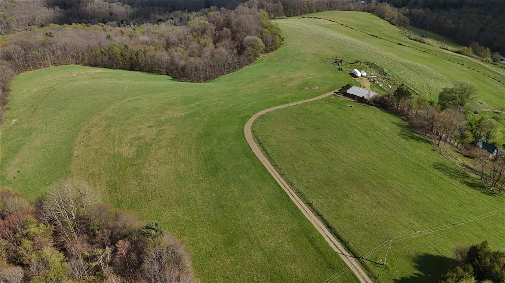 294 Sprankle Road Punxsutawney, PA 15767 - Photo 3 of 23 a view of a swimming pool and a yard