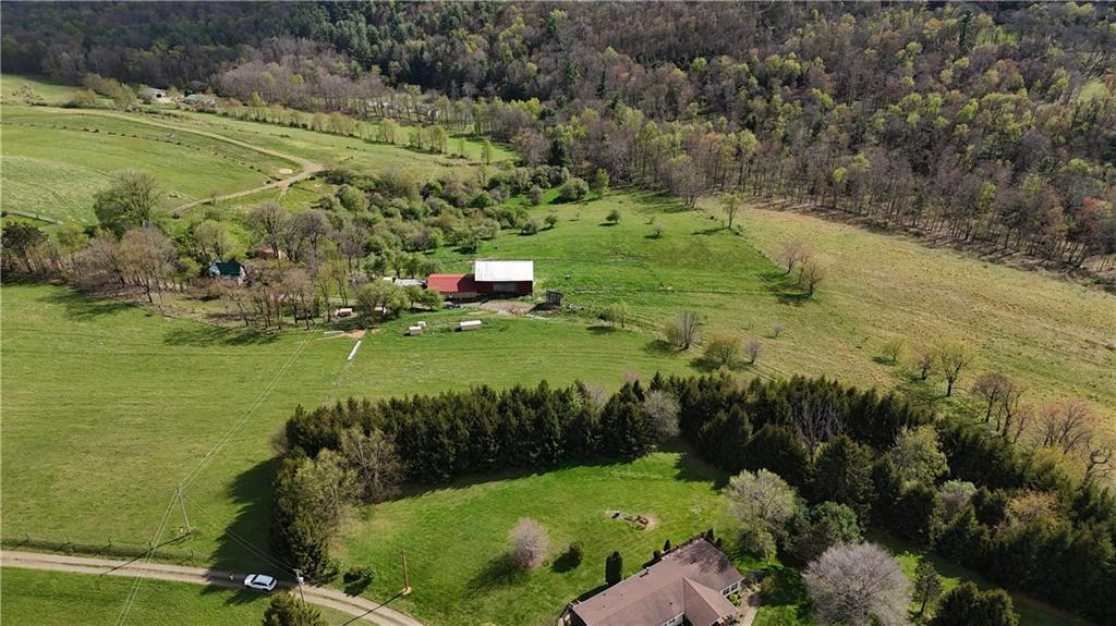 294 Sprankle Road Punxsutawney, PA 15767 - Photo 4 of 23 a view of a water pond with green field