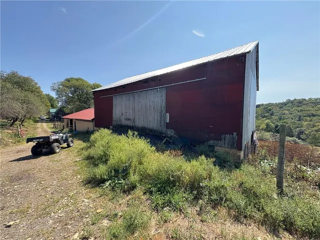 a view of a back yard of the house