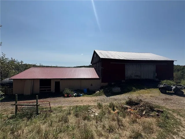 a front view of house with yard and seating space
