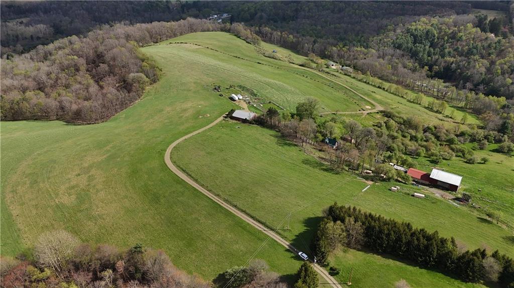 294 Sprankle Road Punxsutawney, PA 15767 - Photo 7 of 23 a view of a swimming pool with a yard