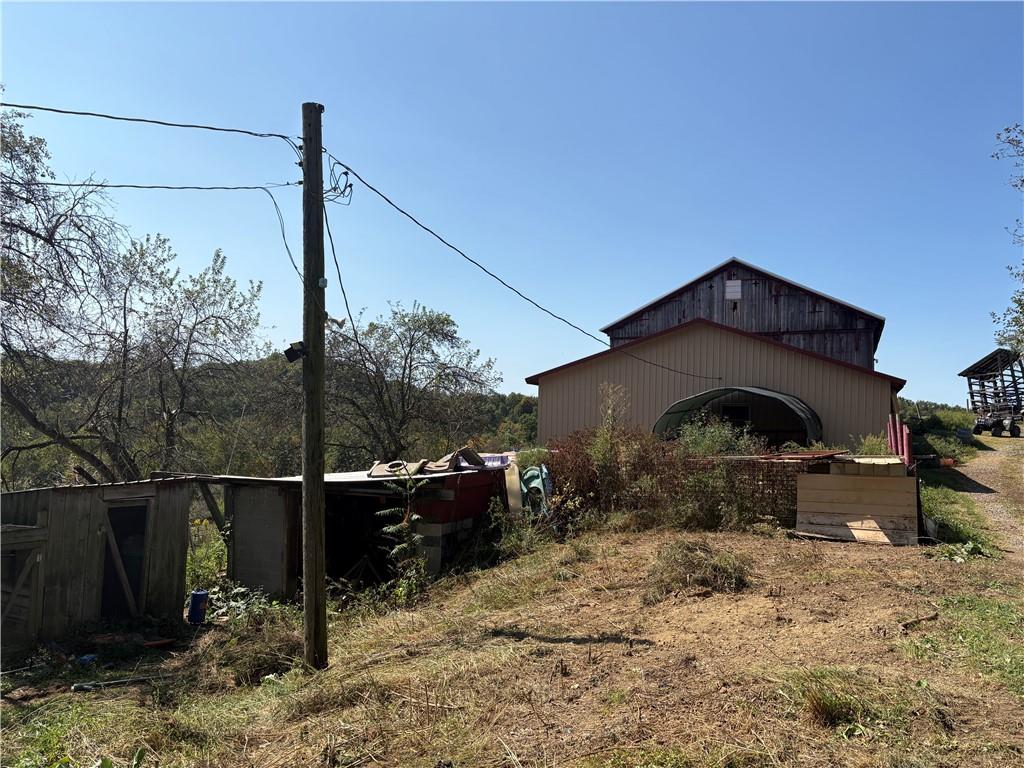 294 Sprankle Road Punxsutawney, PA 15767 - Photo 8 of 28 a front view of a house with a yard
