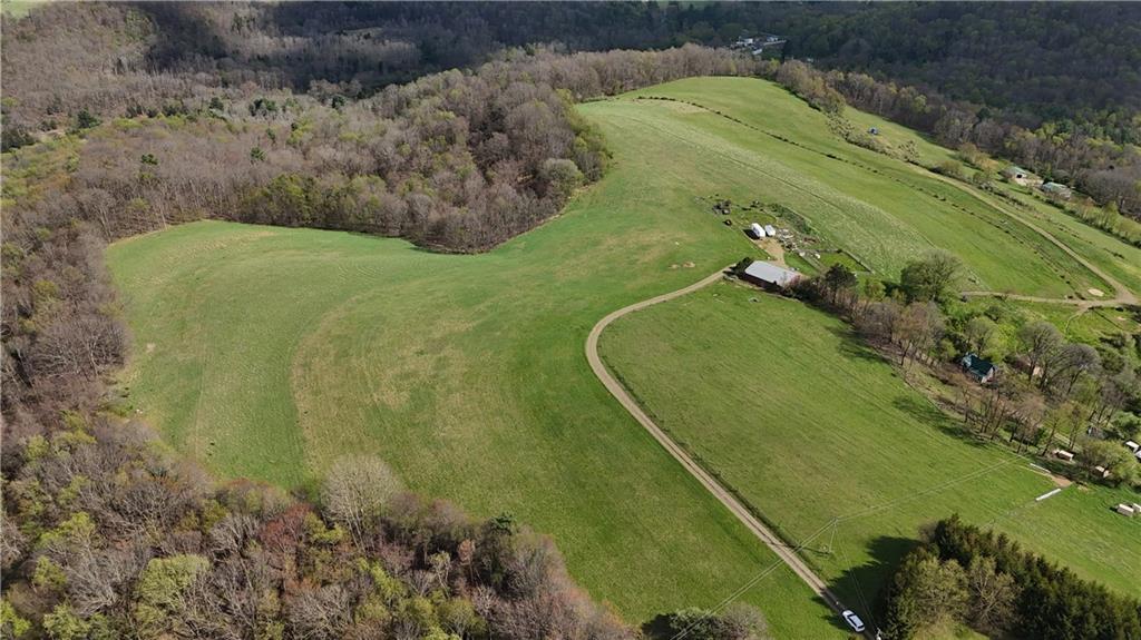 294 Sprankle Road Punxsutawney, PA 15767 - Photo 8 of 23 a view of a lake with a yard