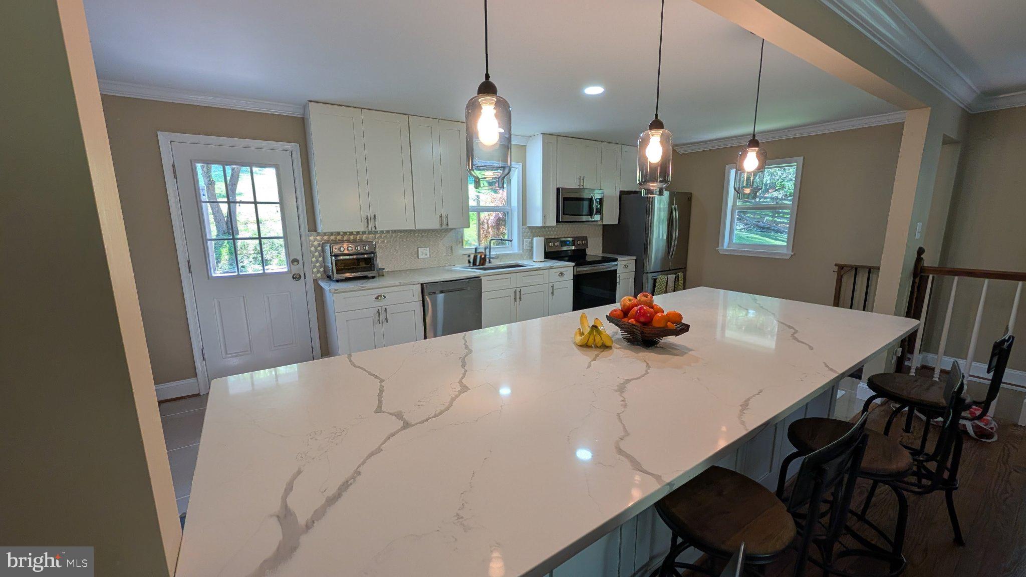 15715 Tierra Drive Silver Spring, MD 20906 - Photo 12 of 40 Modern kitchen with elegant finishes.