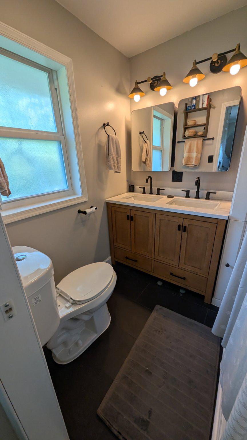 15715 Tierra Drive Silver Spring, MD 20906 - Photo 18 of 40 Ensuite modern bathroom with stylish fixtures.