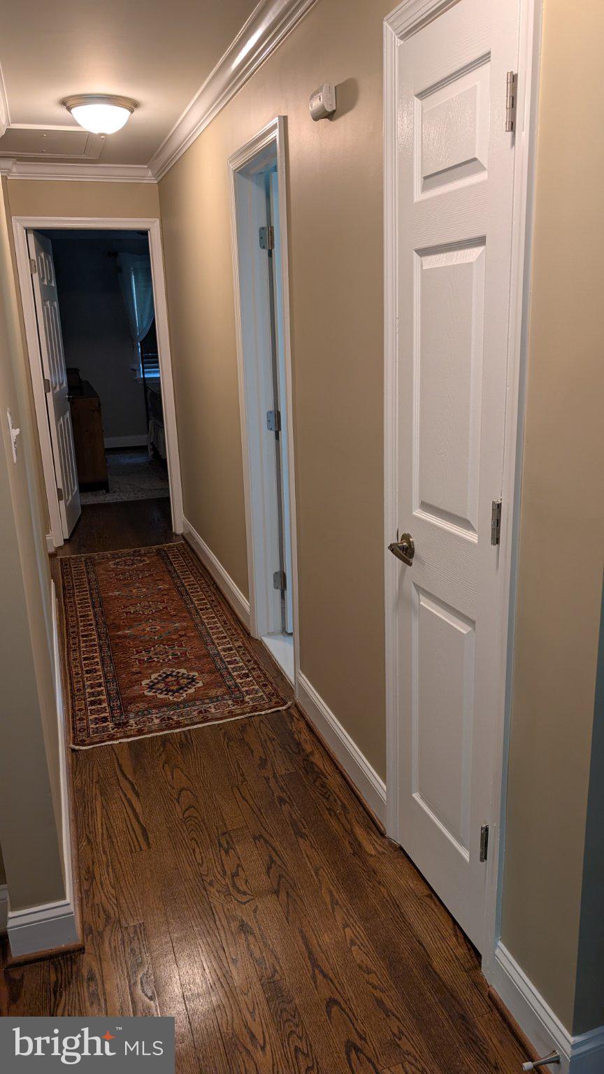 15715 Tierra Drive Silver Spring, MD 20906 - Photo 19 of 40 Inviting hallway with warm tones.