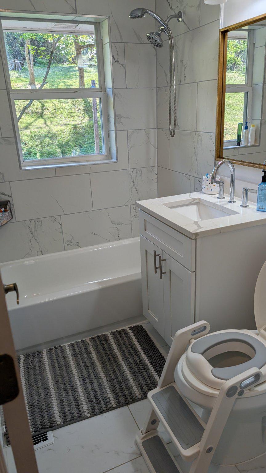15715 Tierra Drive Silver Spring, MD 20906 - Photo 20 of 40 Modern hall bathroom with natural light.
