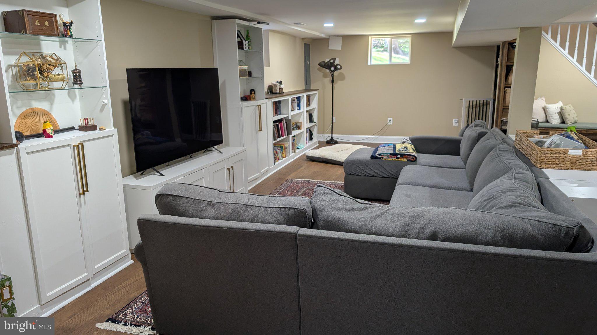 15715 Tierra Drive Silver Spring, MD 20906 - Photo 26 of 40 Modern basement retreat with cozy vibes.