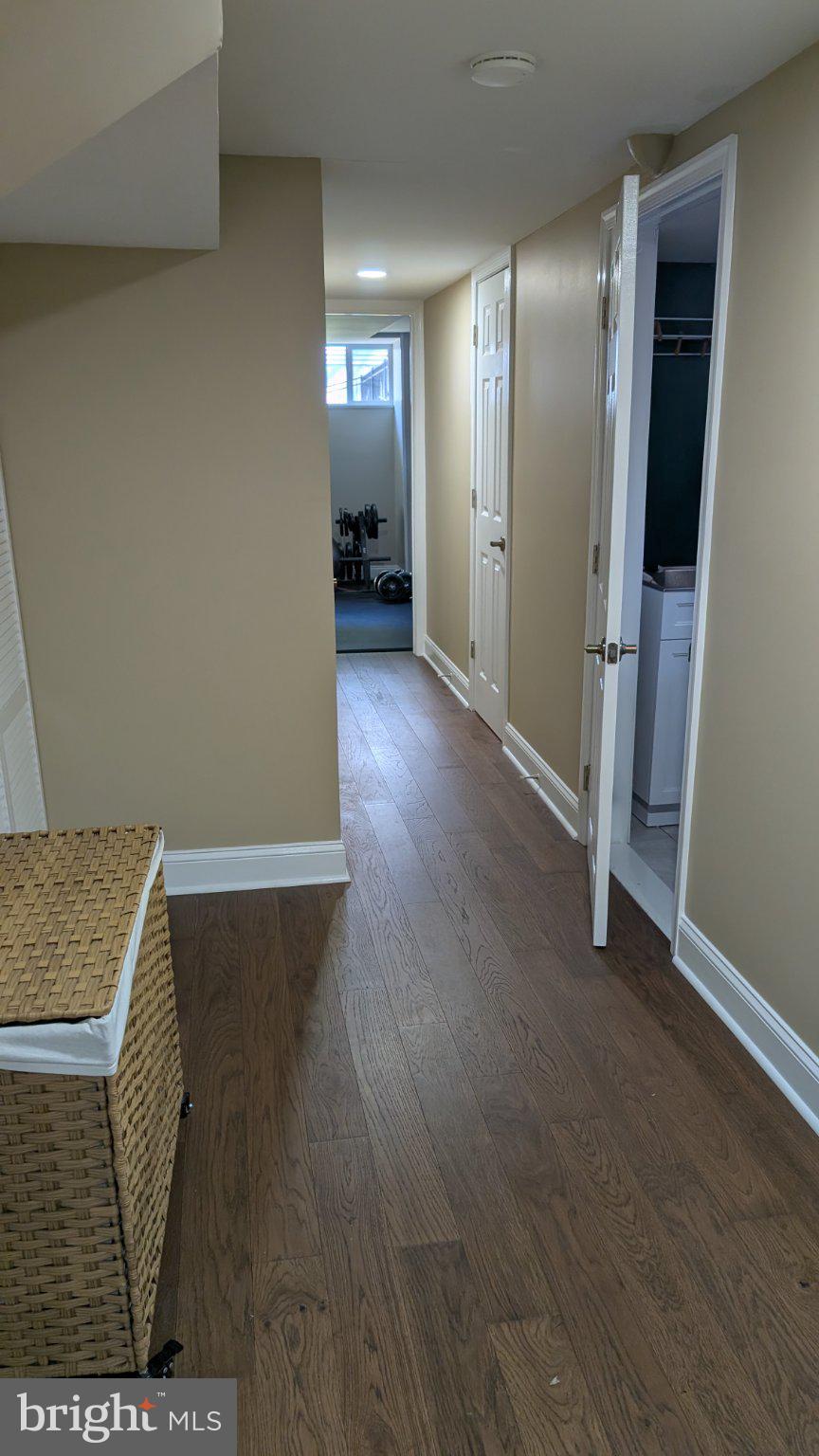 15715 Tierra Drive Silver Spring, MD 20906 - Photo 28 of 40 Inviting hallway with warm tones.