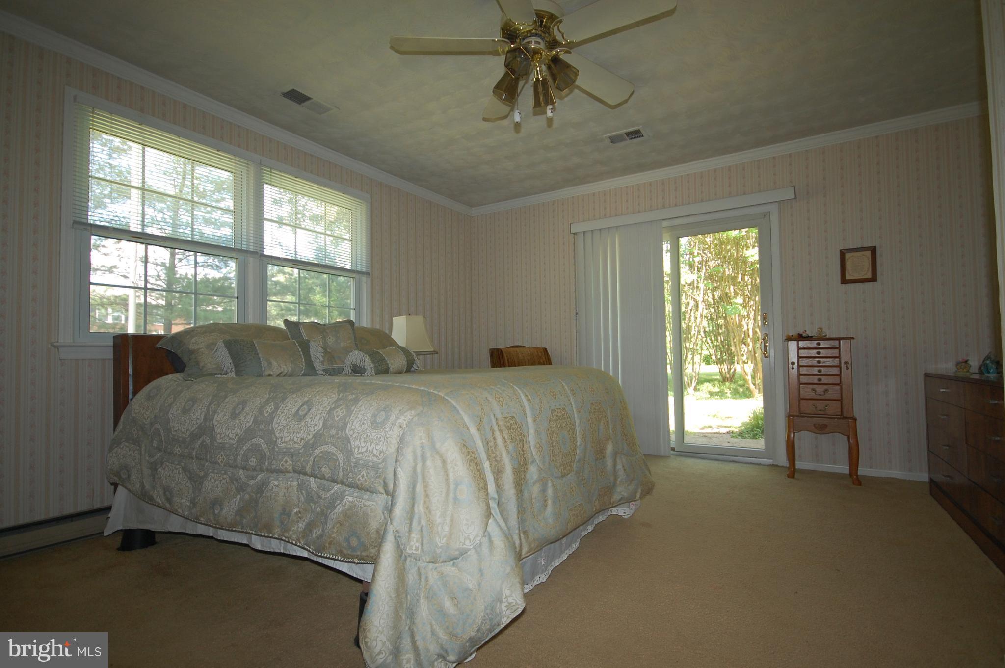 6175 Howells Road Alexandria, VA 22310 - Photo 6 of 30 Large Master Bedroom with Patio to Enjoy Coffee