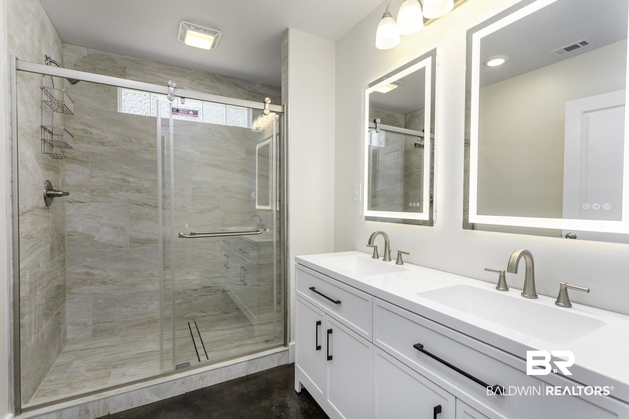17126 Sugar Loop Foley, AL 36535 - Photo 11 of 28 Bathroom with a stall shower and double vanity