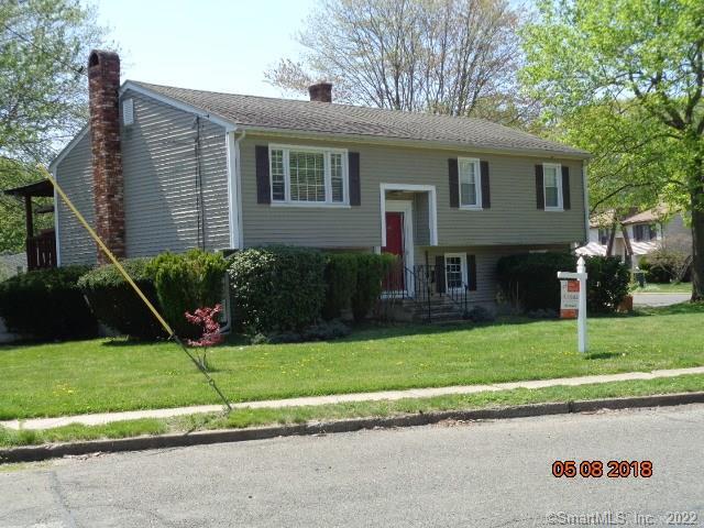 140 Williamsburg Road Bridgeport, CT 06606 - Photo 1 of 1 a view of a house with backyard and a tree