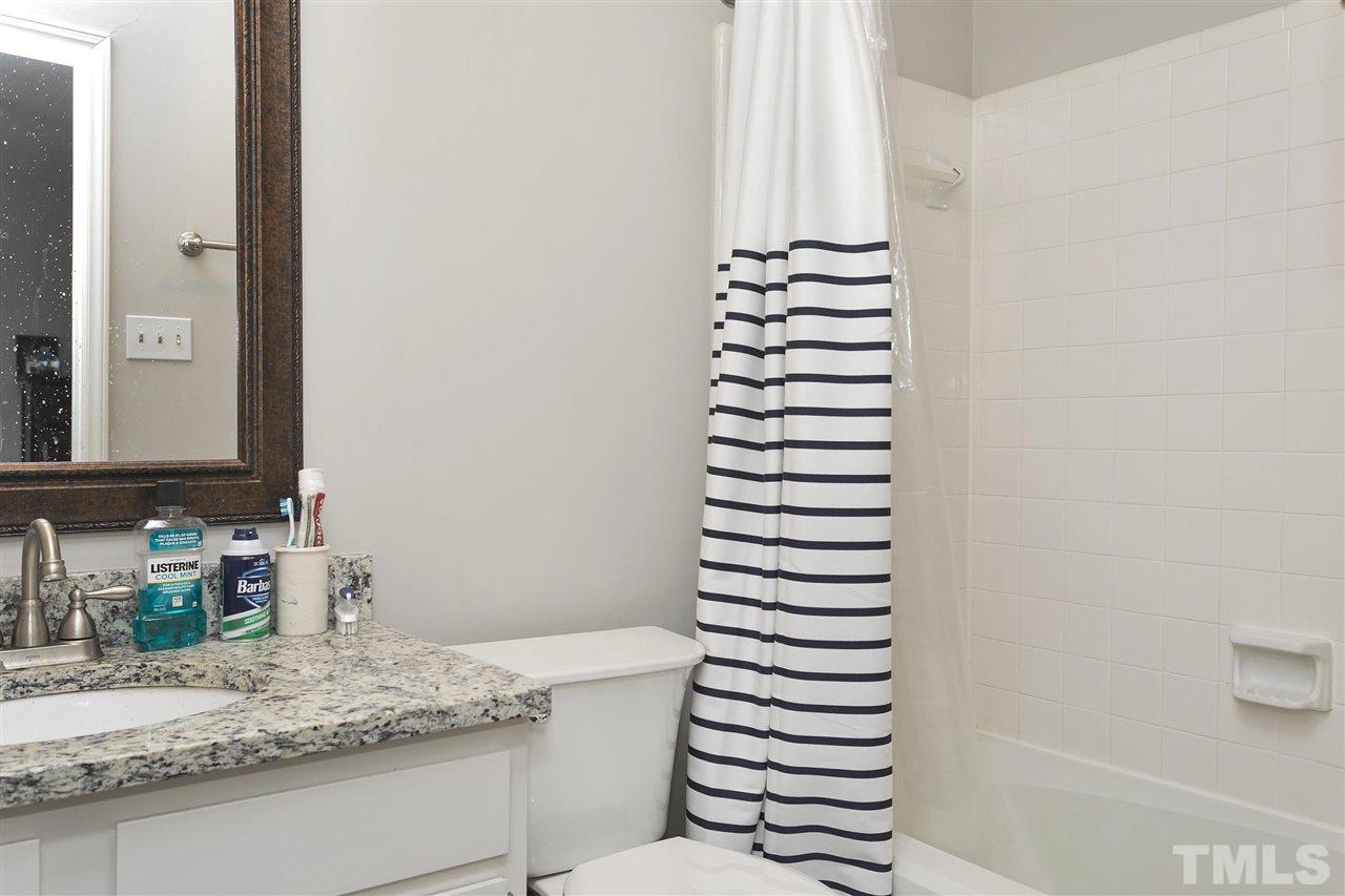 727 Benchmark Drive Raleigh, NC 27615 - Photo 15 of 22 Second Private Master Bath with Trendy Flooring and Ashen White Granite Counter Top!