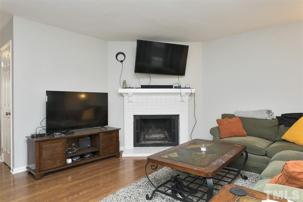 727 Benchmark Drive Raleigh, NC 27615 - Photo 7 of 22 Wood Burning Fireplace is so nice in the winter!