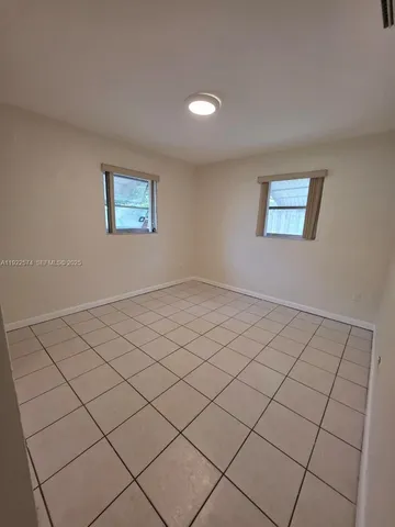 a view of a room and window