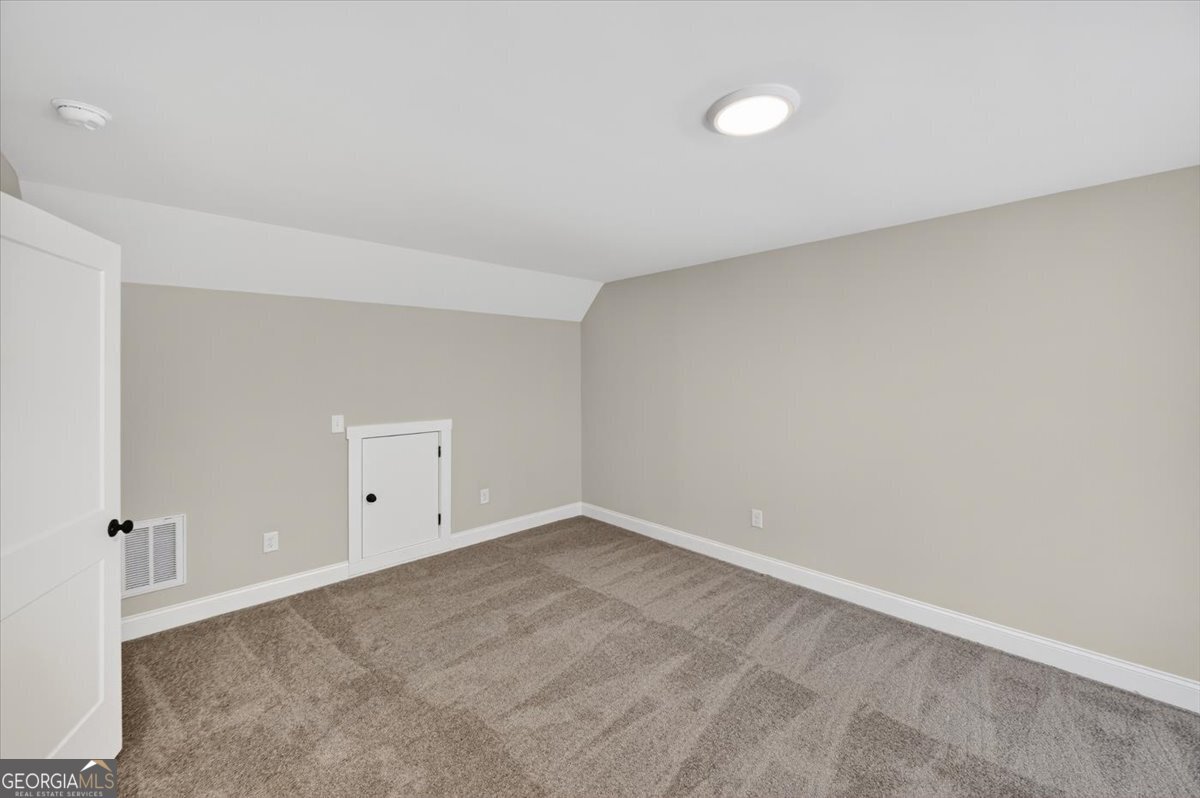 98 Mud Bridge Road The Rock, GA 30285 - Photo 33 of 47 a view of an empty room