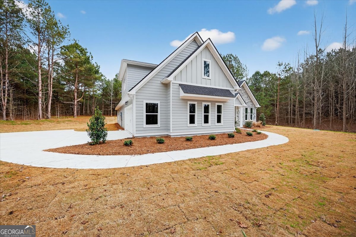 98 Mud Bridge Road The Rock, GA 30285 - Photo 40 of 47 a front view of a house with a yard