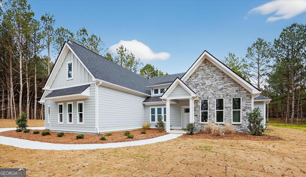 98 Mud Bridge Road The Rock, GA 30285 - Photo 4 of 47 a front view of a house with a yard