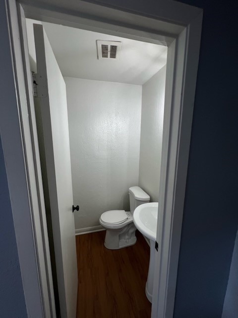 3511 Alpine Circle, Unit 2 Austin, TX 78704 - Photo 13 of 16 a bathroom with a sink and a toilet