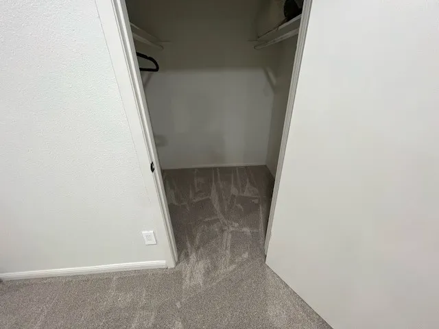 a view of a house with a street