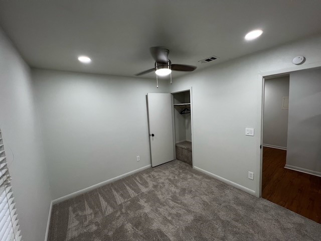 3511 Alpine Circle, Unit 2 Austin, TX 78704 - Photo 10 of 16 an empty room with a ceiling fan and a window