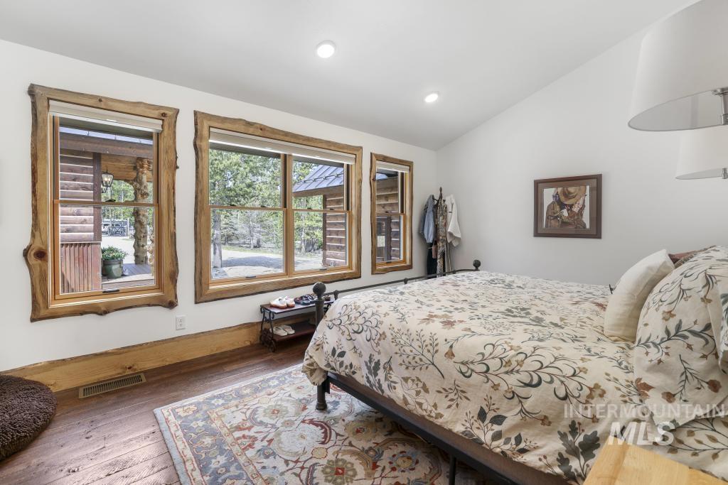 65 Goat Creek Way Stanley, ID 83278 - Photo 21 of 32 Room with vaulted ceiling and white walls