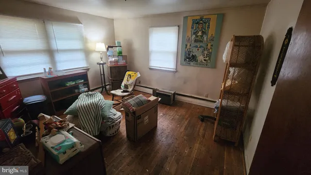 a room with furniture and a flat screen tv