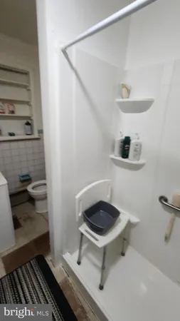 a bathroom with a sink and a window