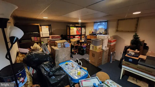 a room with gym equipment and a mirror