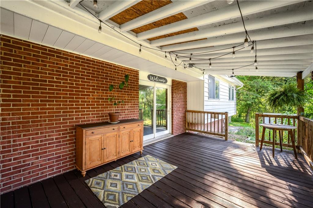 809 West Old Rte 422 Butler, PA 16001 - Photo 25 of 31 a view of a porch with wooden floor