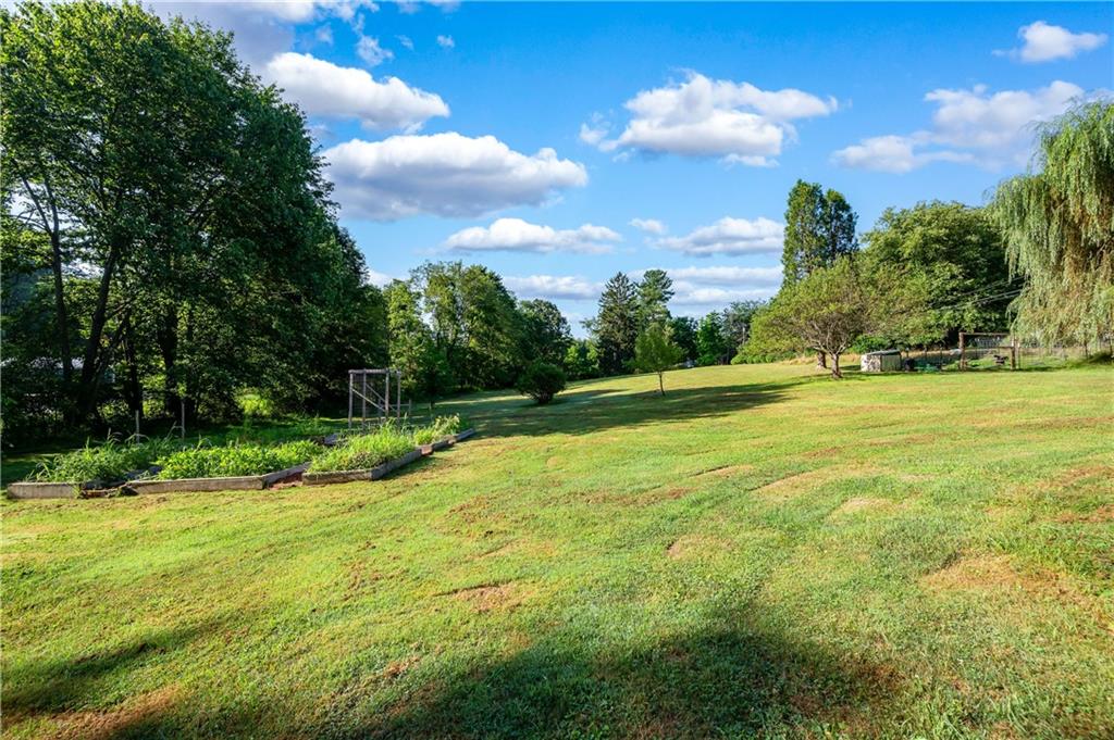 809 West Old Rte 422 Butler, PA 16001 - Photo 30 of 31 a view of a golf course with a lake