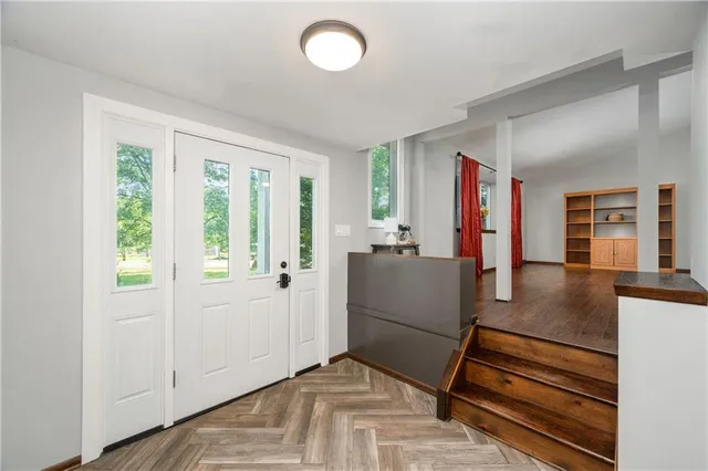 a view of livingroom with furniture and window