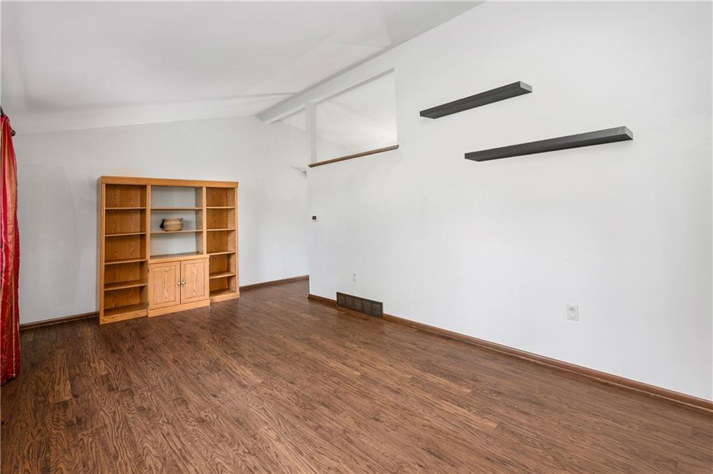 809 West Old Rte 422 Butler, PA 16001 - Photo 6 of 31 an empty room with wooden floor closet and windows