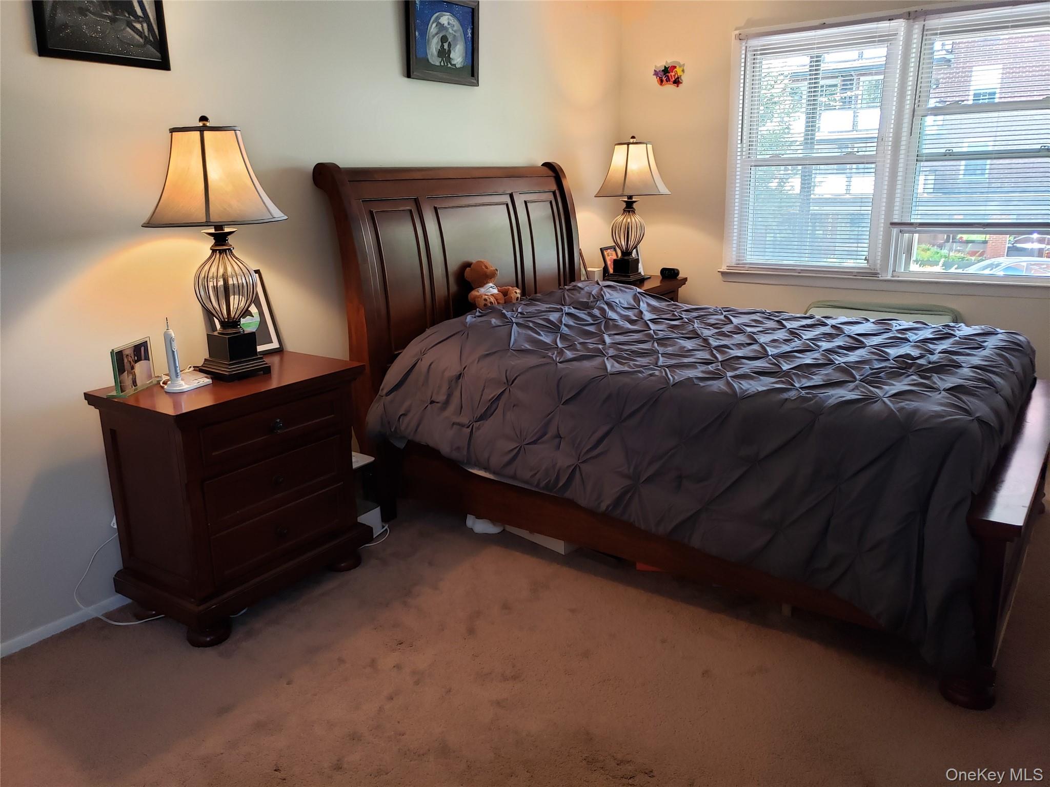 16-74 Bell Boulevard Queens, NY 11360 - Photo 12 of 20 Bedroom featuring carpet flooring and baseboards