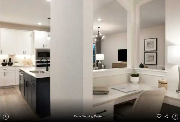 a kitchen with a sink cabinets and appliances