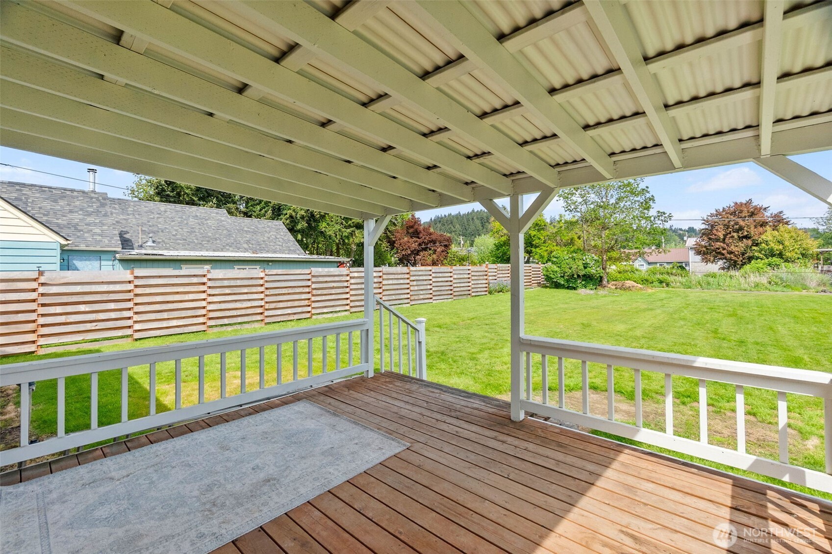 372 Southwest 14th Street Chehalis, WA 98532 - Photo 15 of 15 a view of a deck with a yard