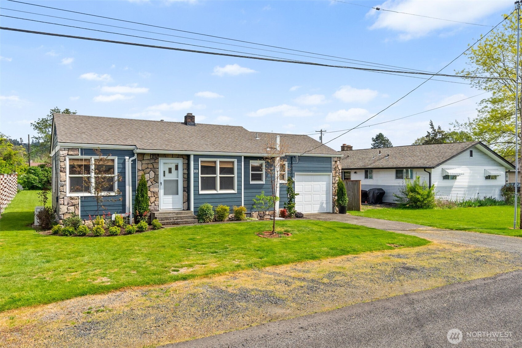 372 Southwest 14th Street Chehalis, WA 98532 - Photo 2 of 15 a front view of a house with a yard and porch