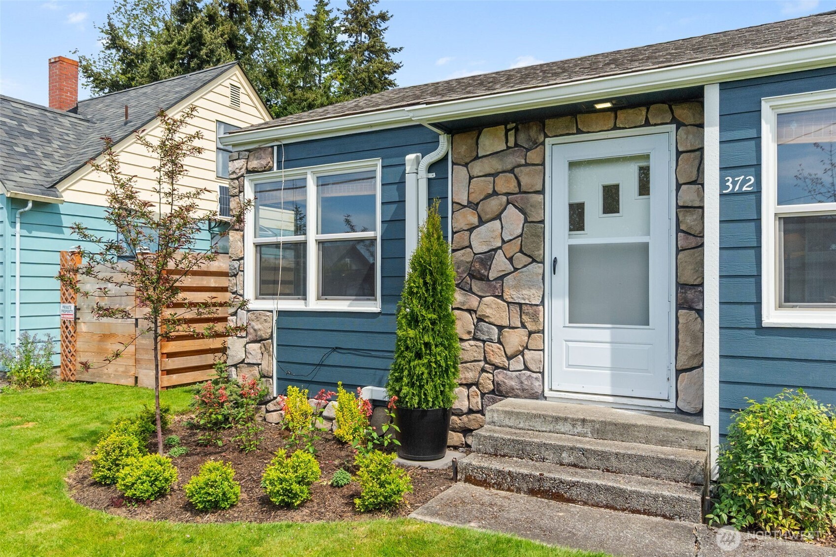 372 Southwest 14th Street Chehalis, WA 98532 - Photo 3 of 15 a front view of a house with a yard
