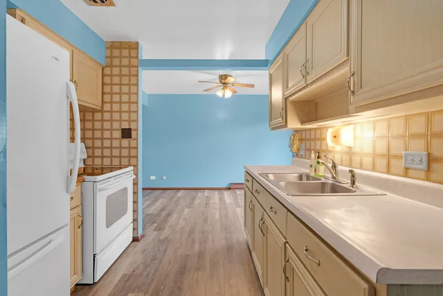 a bathroom with a sink a vanity and a mirror