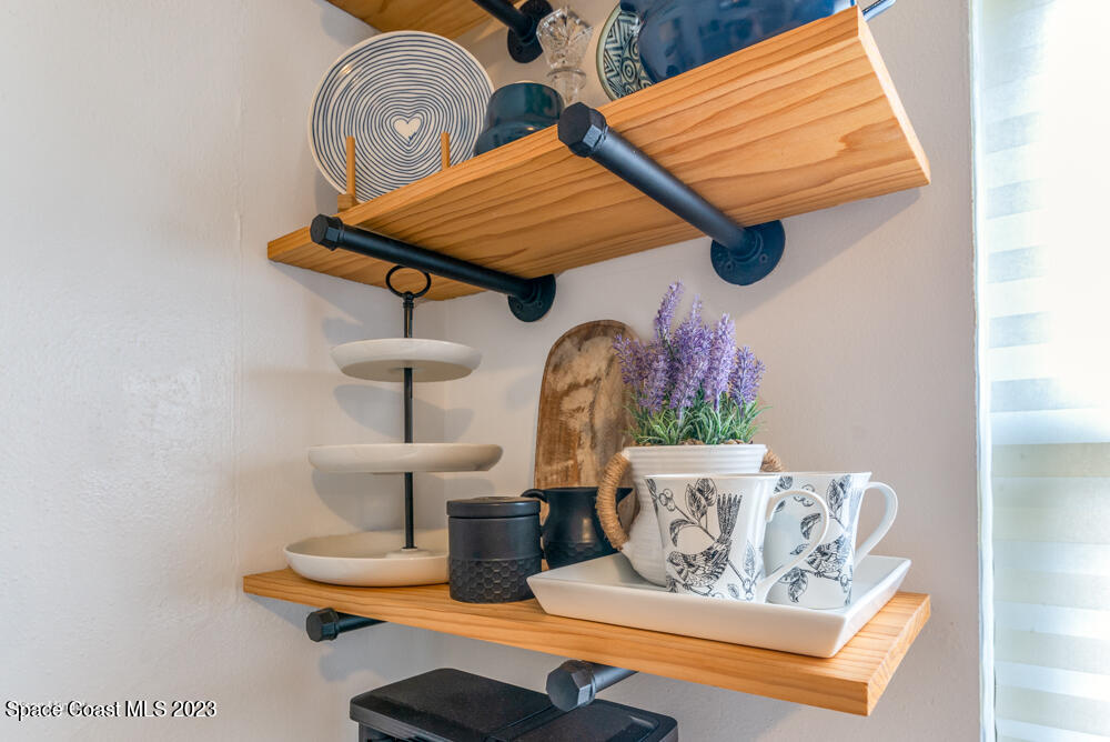2449 Apache Drive Melbourne, FL 32935 - Photo 46 of 61 a living room with furniture and wooden floor