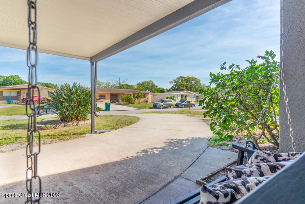 2449 Apache Drive Melbourne, FL 32935 - Photo 6 of 61 Relax In The Shade