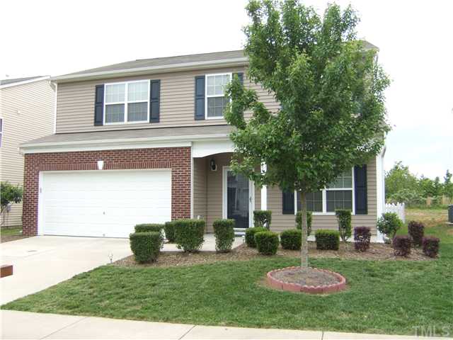 3218 Dove Tree Lane Raleigh, NC 27610 - Photo 15 of 15 a view of a house with backyard porch and sitting area