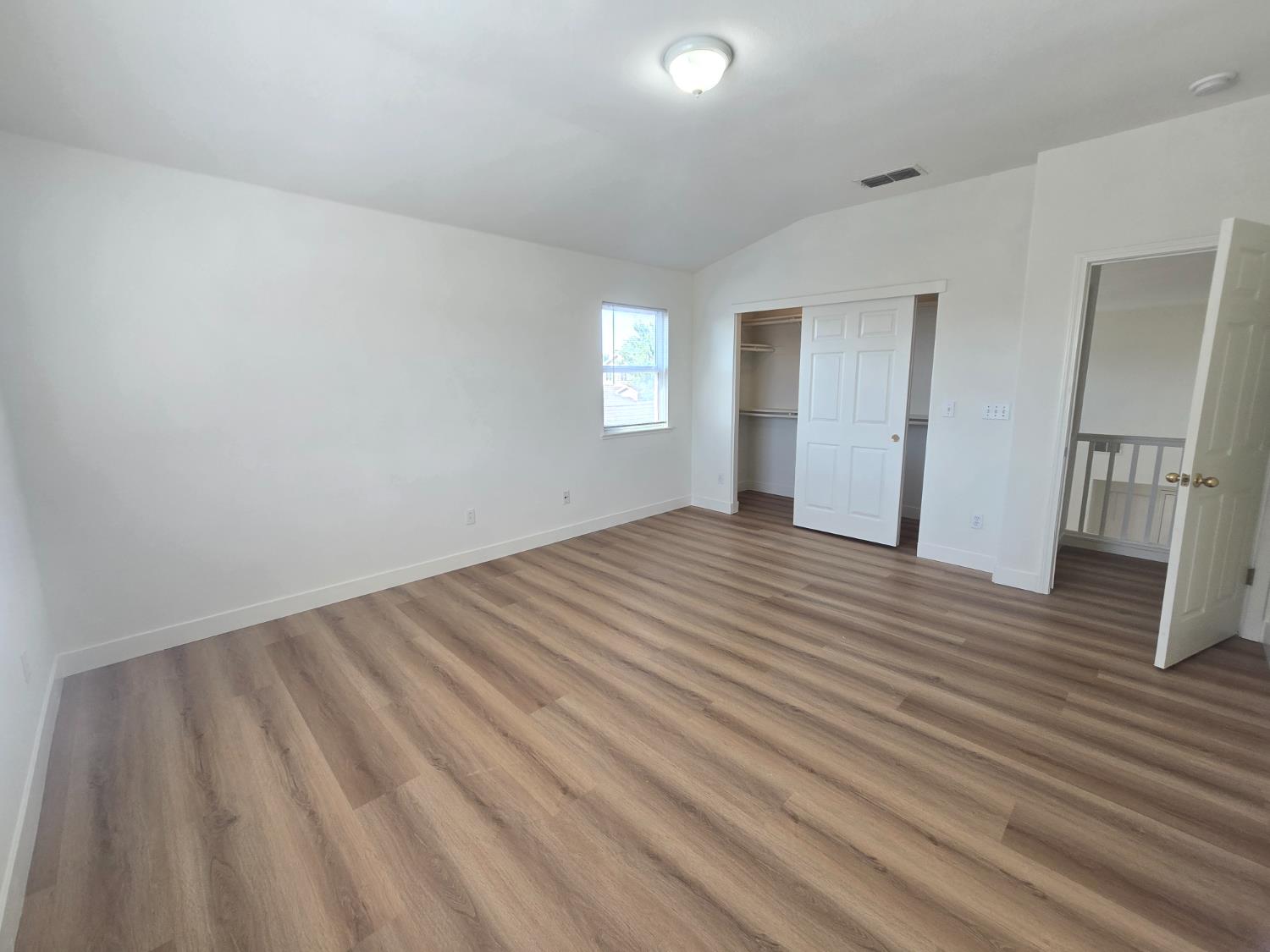 10554 Rudder Way Stockton, CA 95209 - Photo 12 of 40 wooden floor in an empty room
