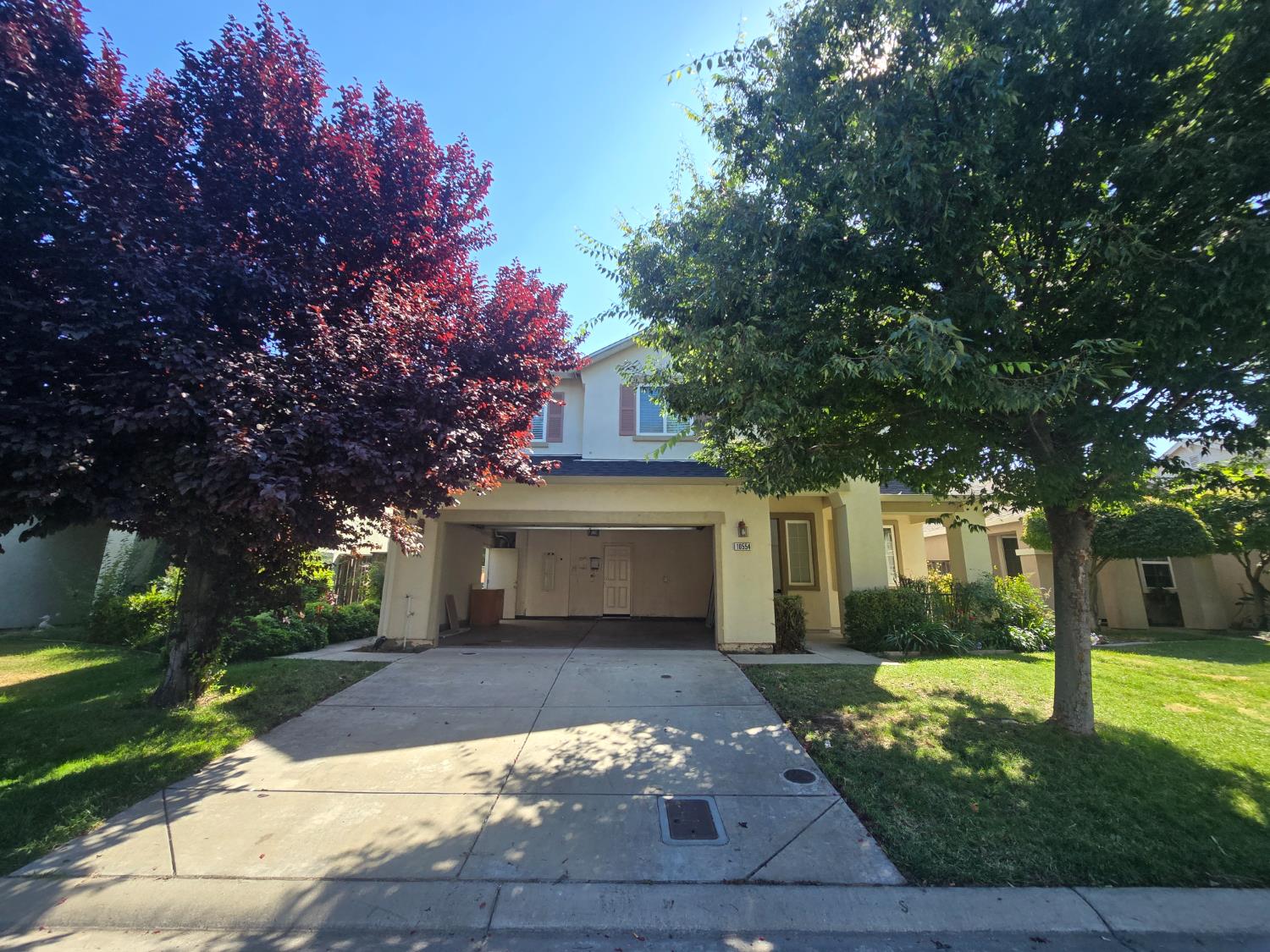 10554 Rudder Way Stockton, CA 95209 - Photo 2 of 40 a front view of a house with garden