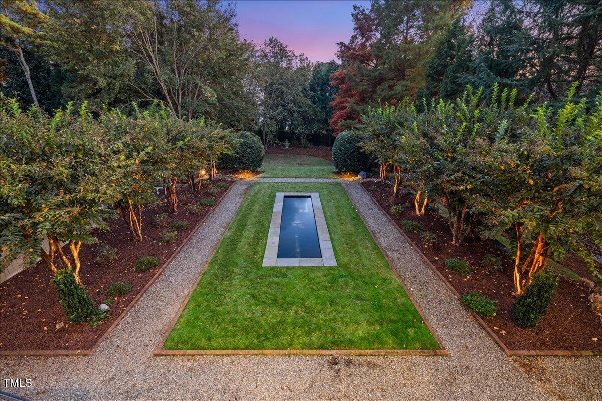 2627 Fairview Road Raleigh, NC 27608 - Photo 6 of 55 Stunning tree lined back yard with Reflection Pond. Pool Ready lot